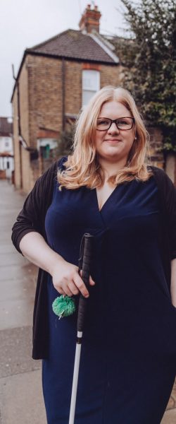 Amy in a dark blue dress